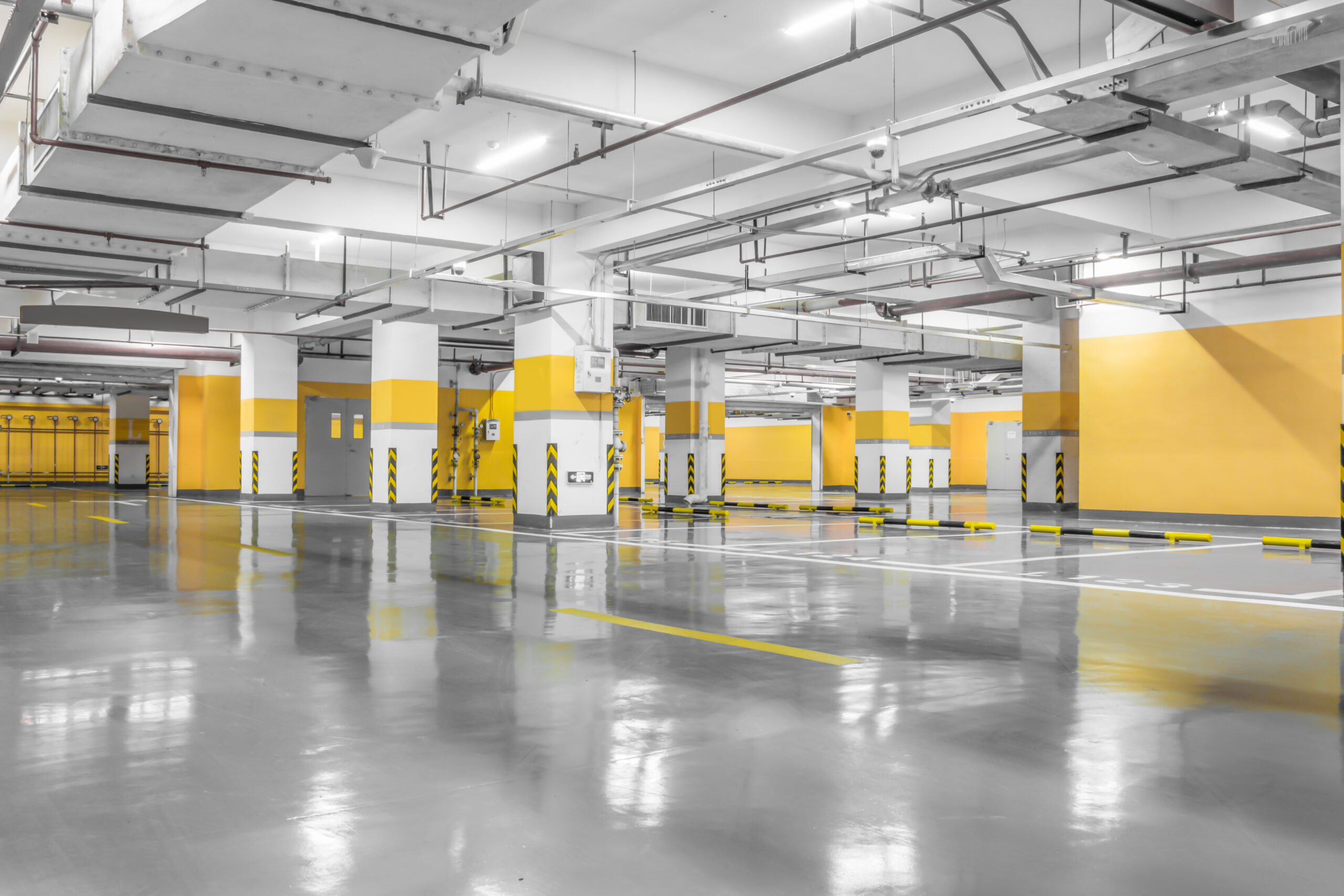 Empty space car park interior at night